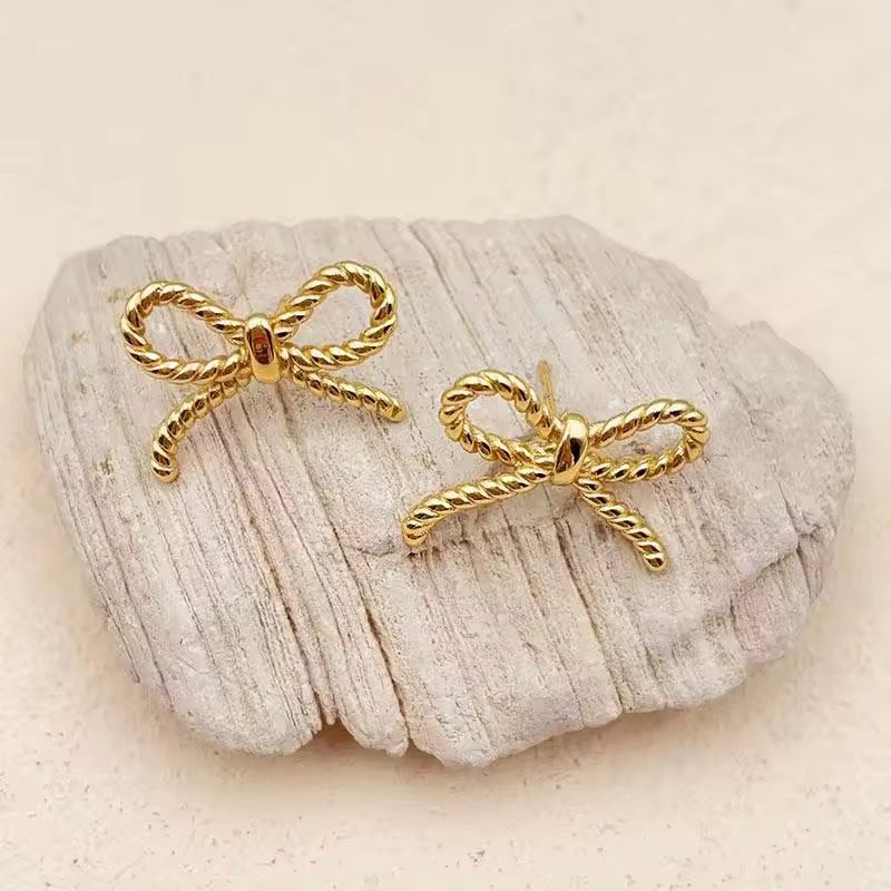 Elegant Bow Style Gold Studs