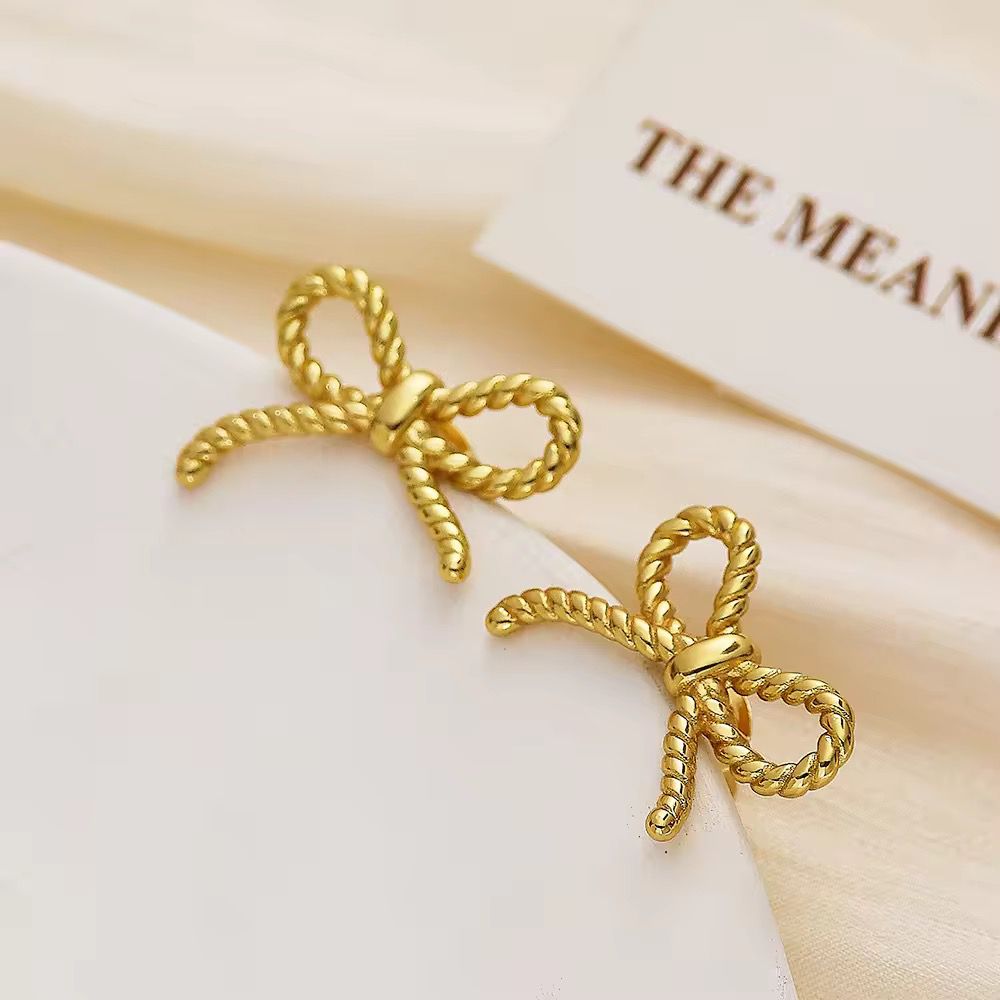 Elegant Bow Style Gold Studs